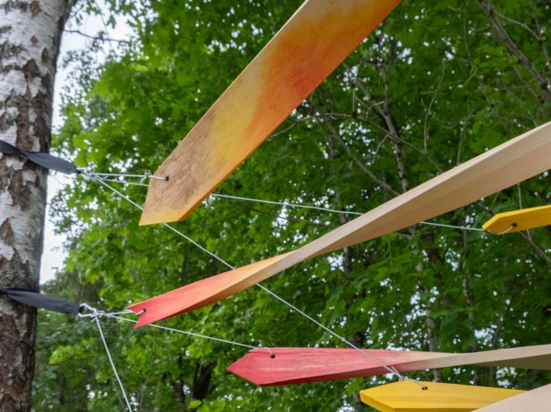 several planks in a tree artist Cathrine Kullberg «Mellom trær»
