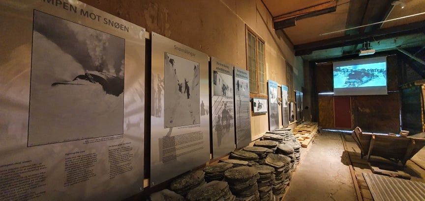 Inside there are big panels with both text, old pictures and film.