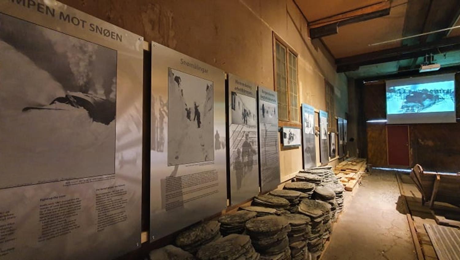 Inside there are big panels with both text, old pictures and film.