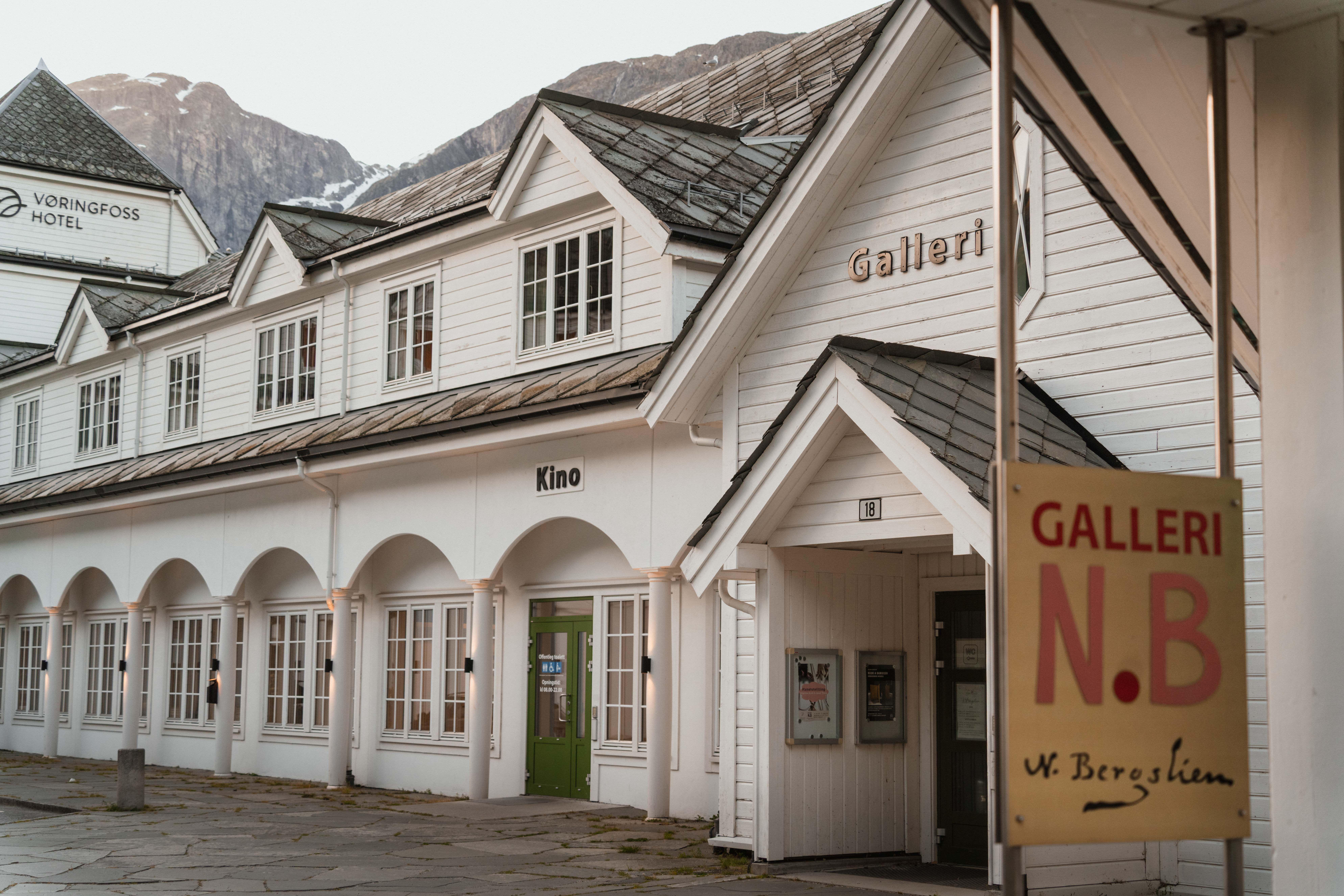 The gallery entrance with the gallery sign in the foreground.
