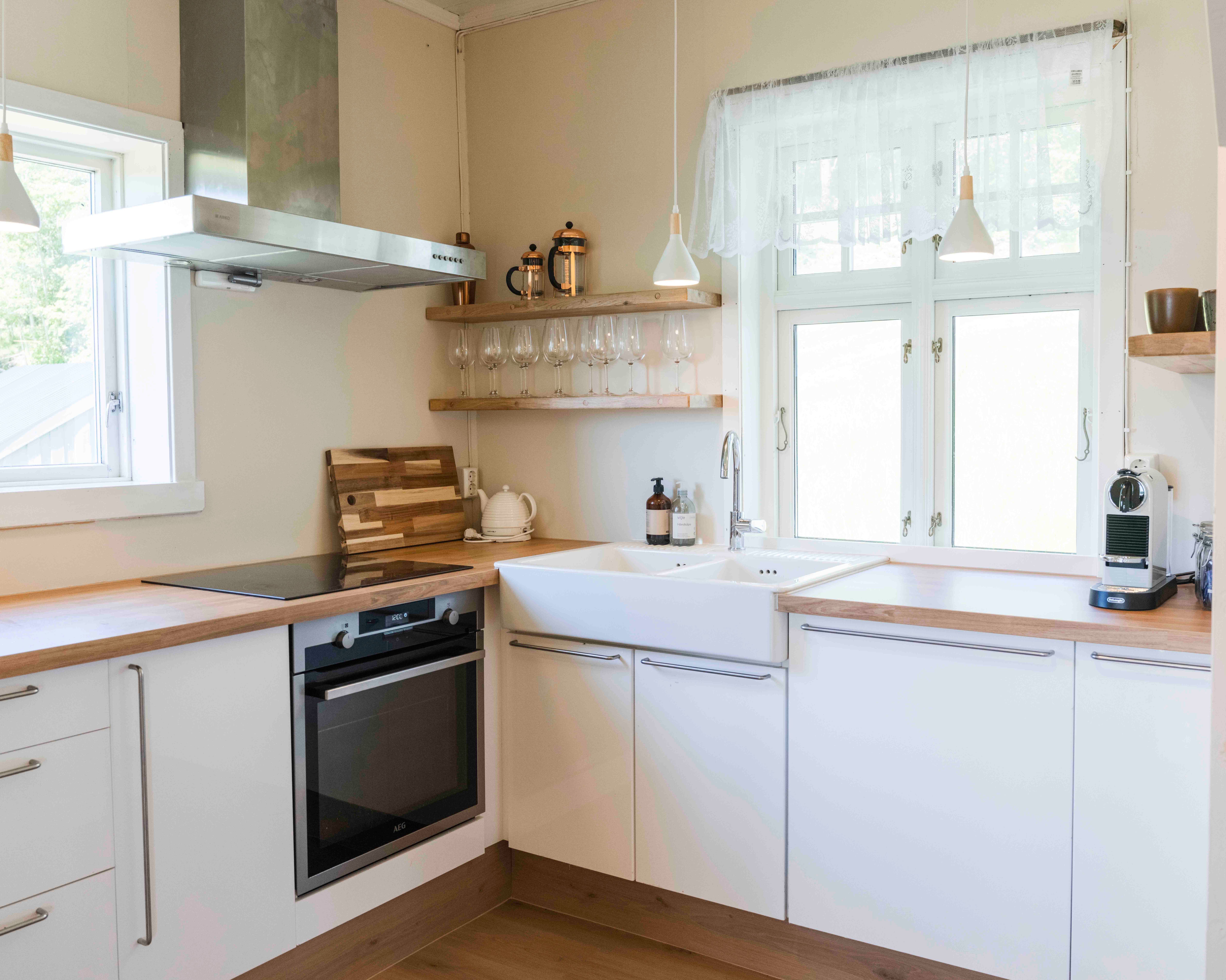 Bright and modern kitchen with Nordic details at Stigen Fjordlodge.