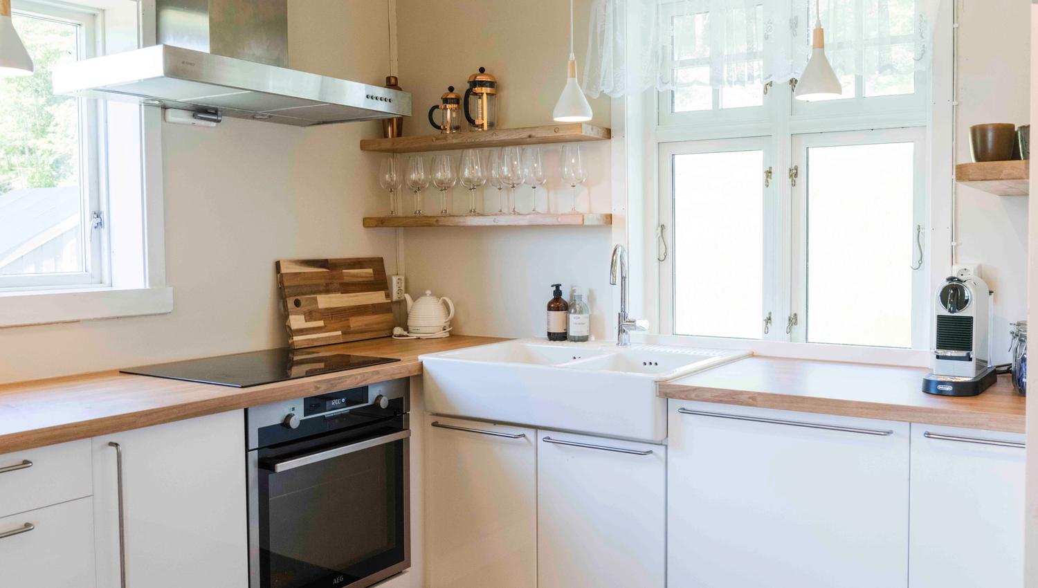 Bright and modern kitchen with Nordic details at Stigen Fjordlodge.