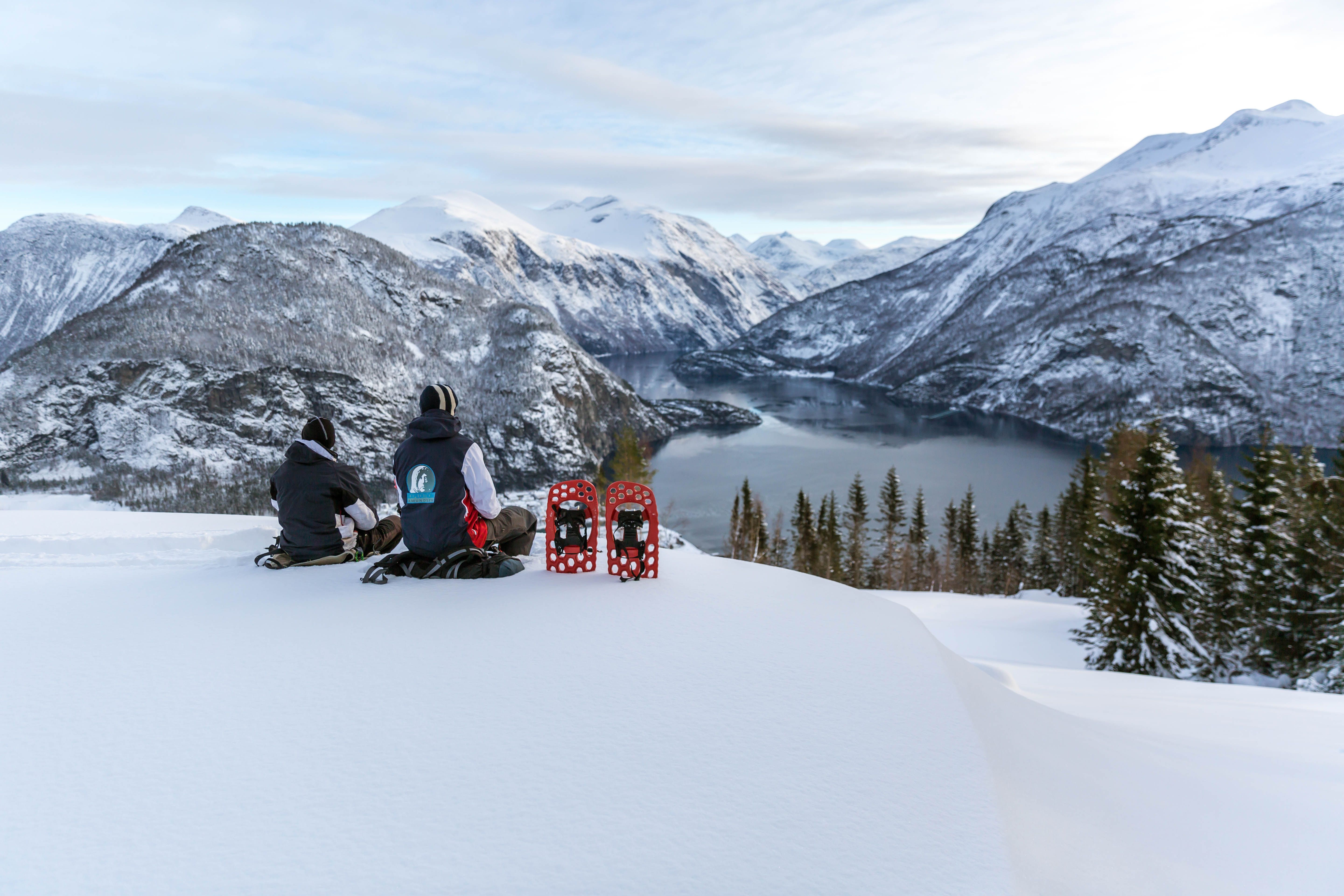 Juvet landscape hotel nature adventure with snowshoes in winter