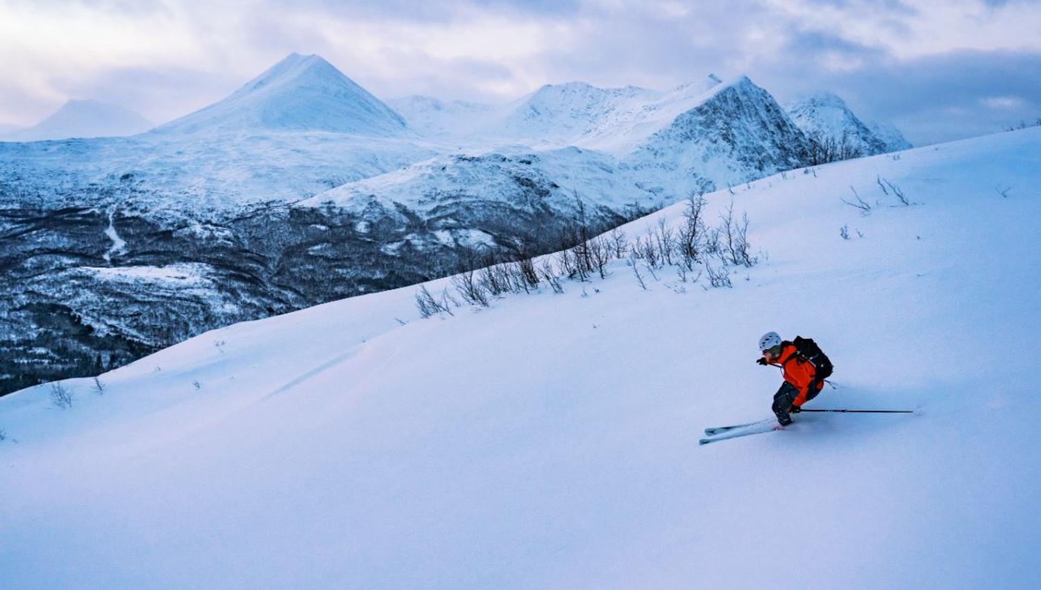 Person skiing down the mountain