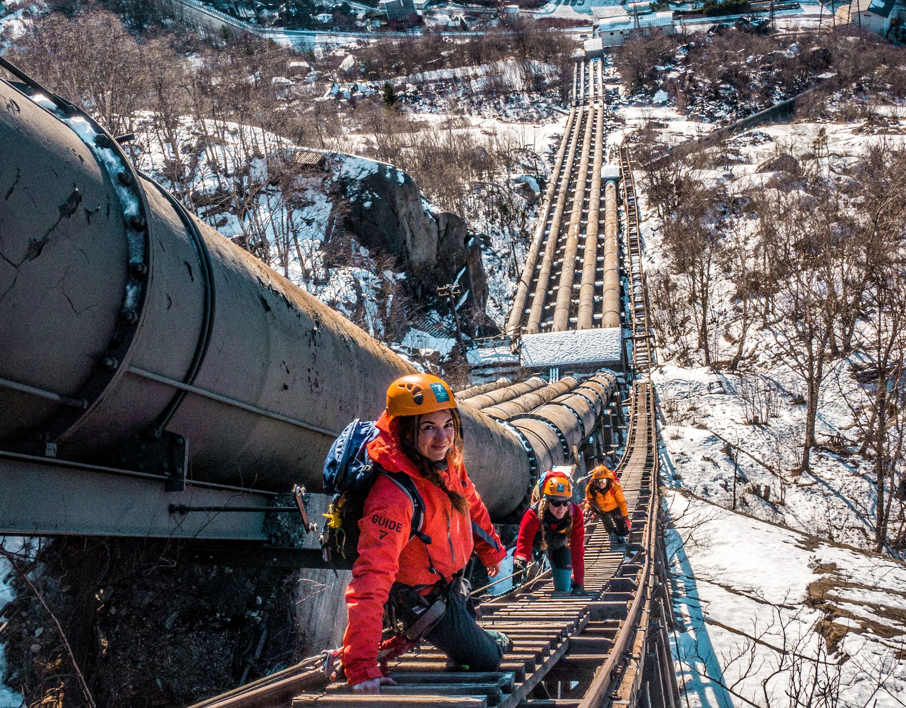 Winter climb on Via Ferrata Tyssedal along the historic pipeline route.