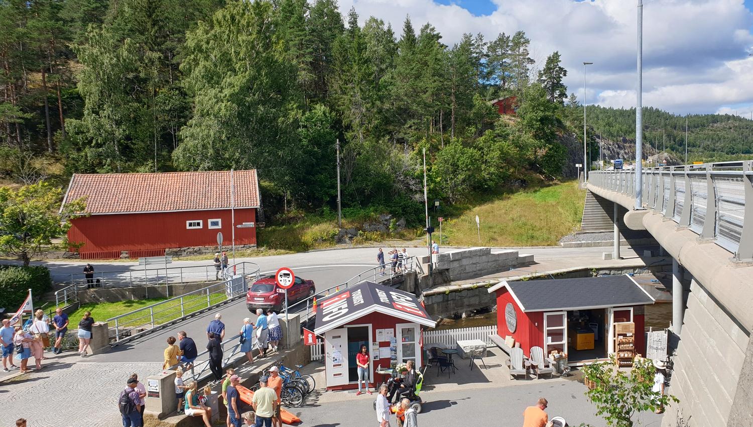 The tourist information with people's life around the arch seen from above