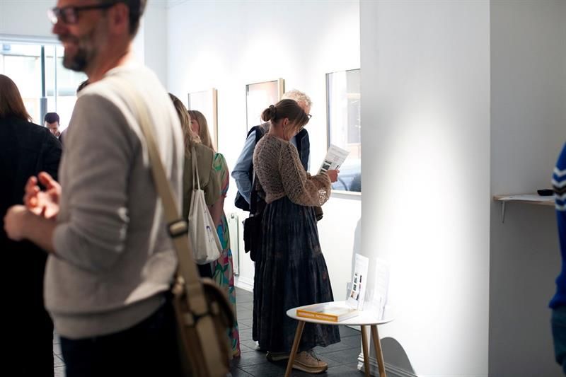 People looking at pictures