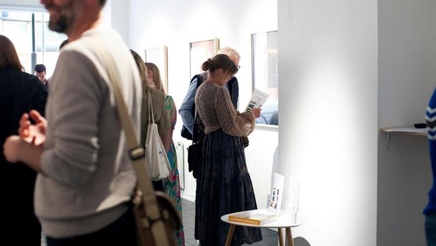 People looking at pictures