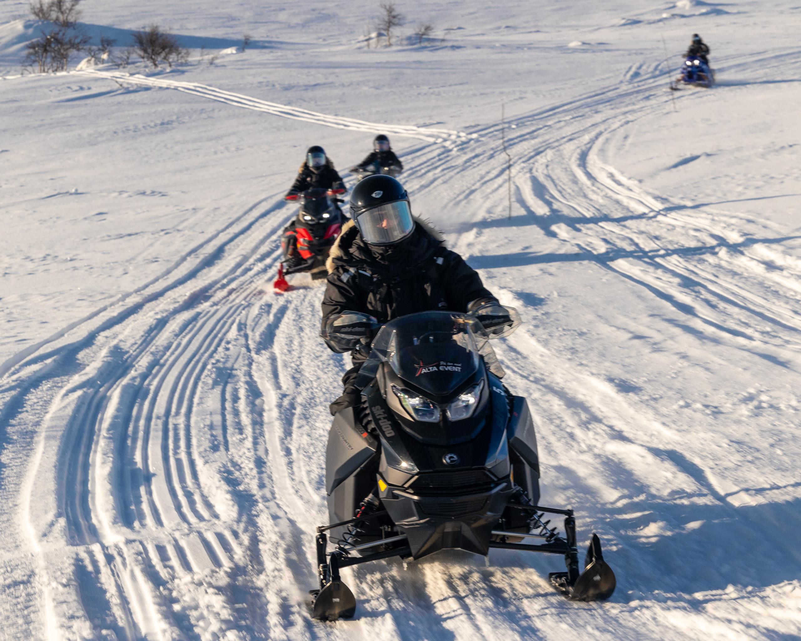 Full day trip by snowmobile