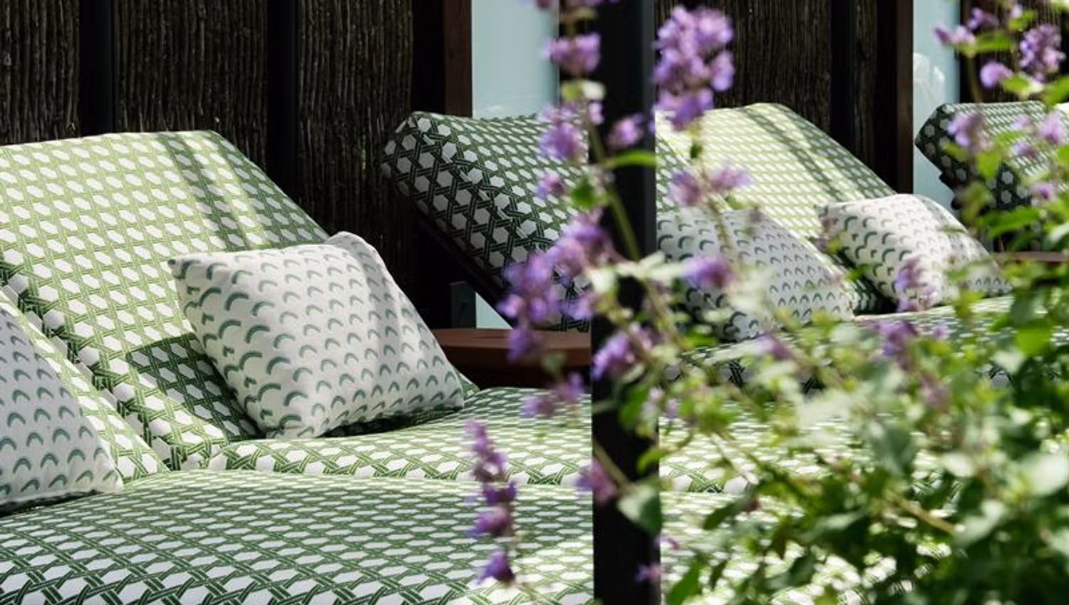 CabanasThe Well - outdoor lounge with green dotted covers