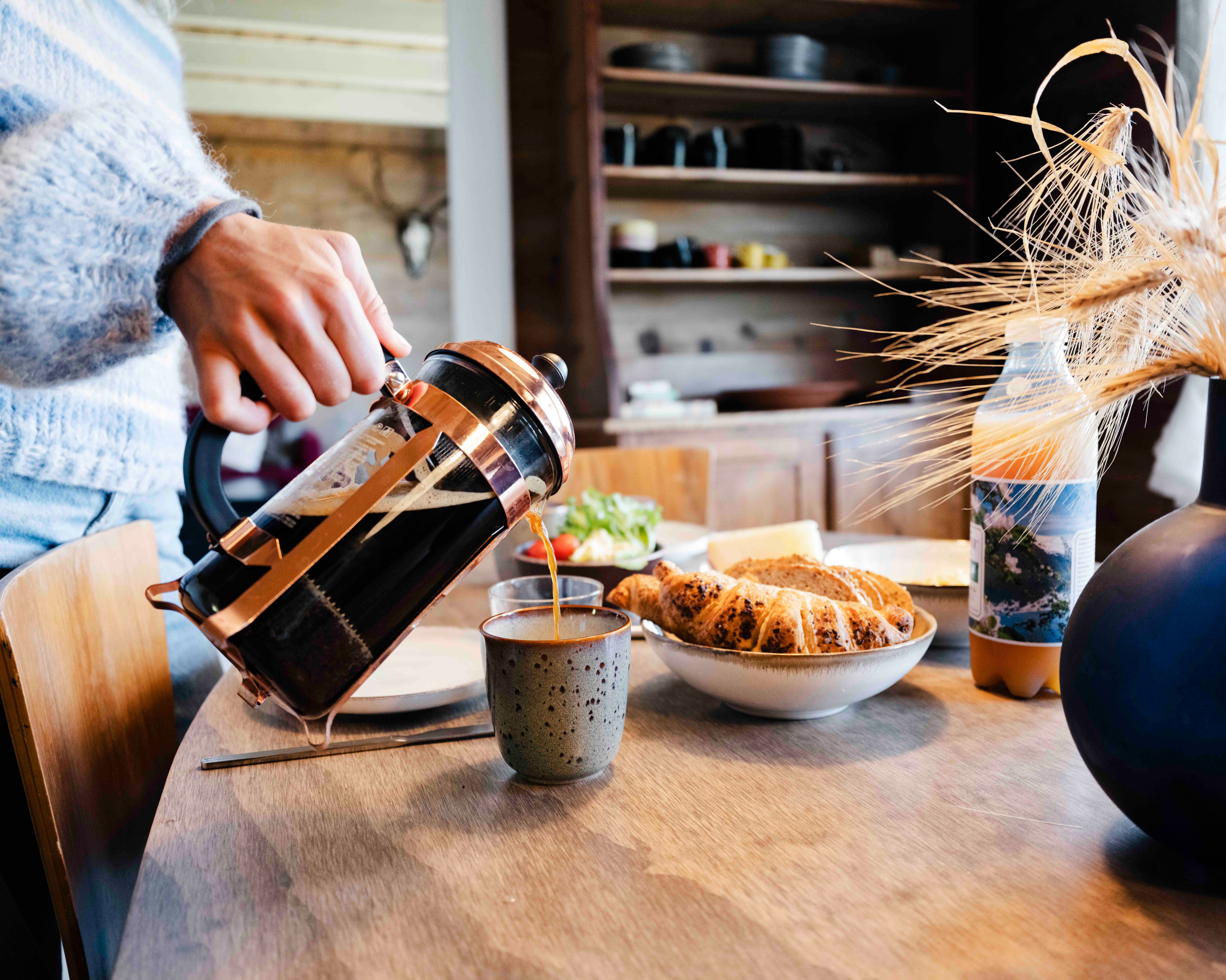 Freshly brewed coffee and breakfast in the dining room at Stigen Fjordlodge in Hardanger.