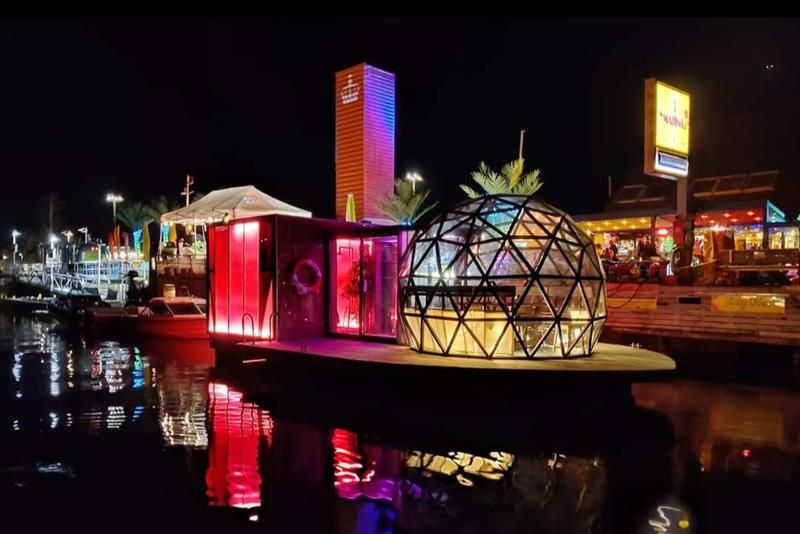 The glass sauna during night
