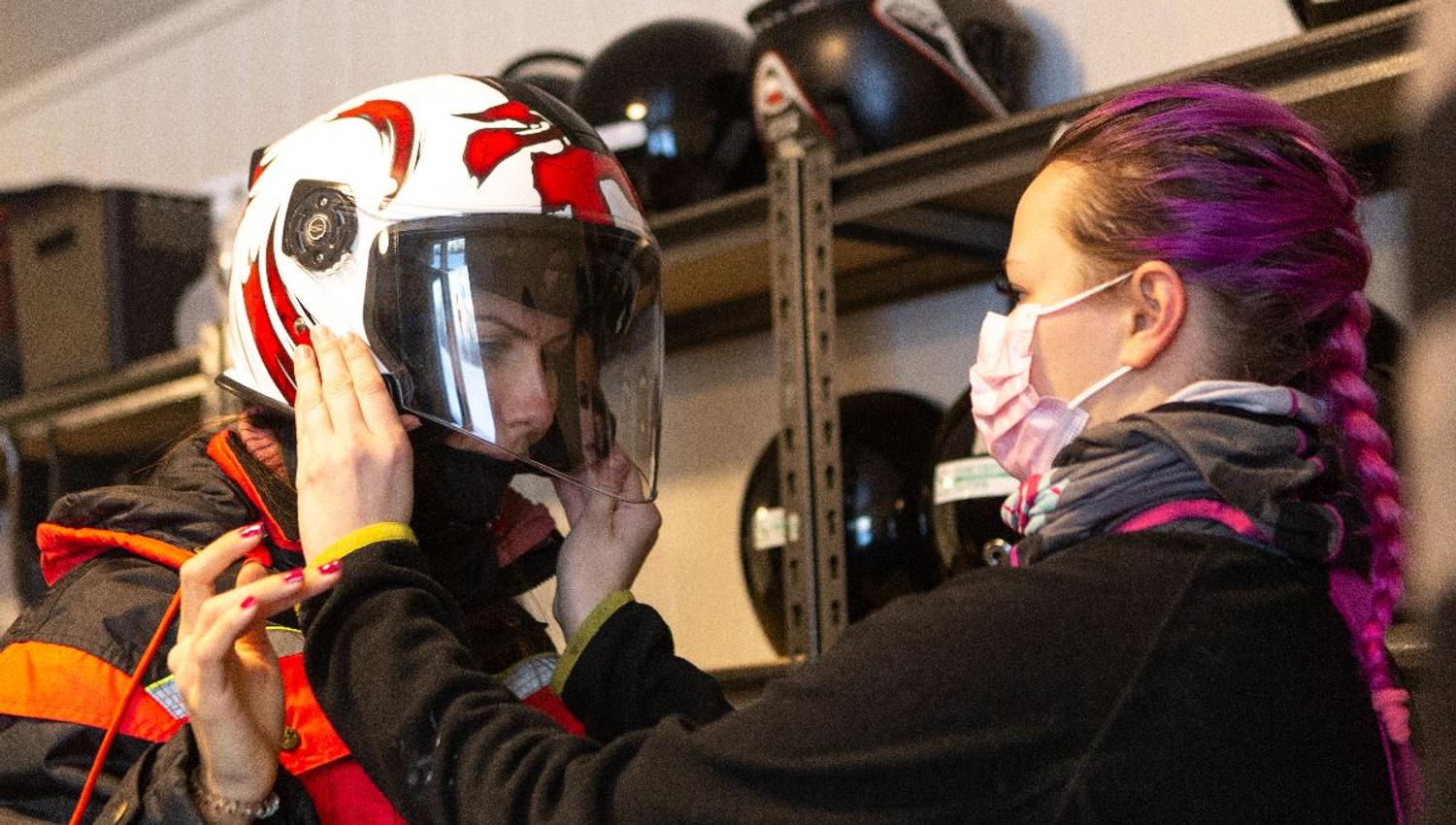 Guest checking if helmet fits