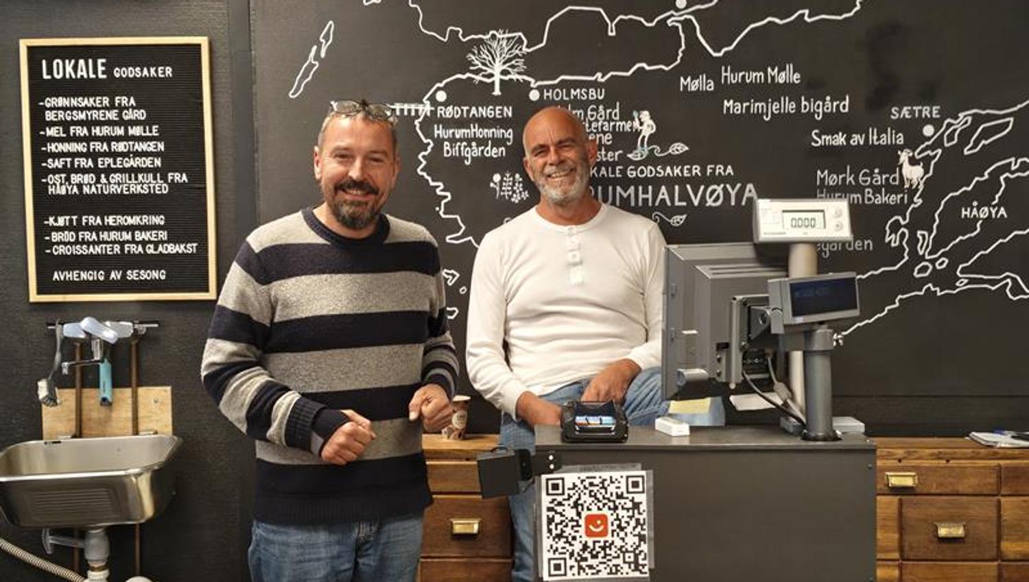Owners of Holmsbu handel, tow guys in front of cashier
