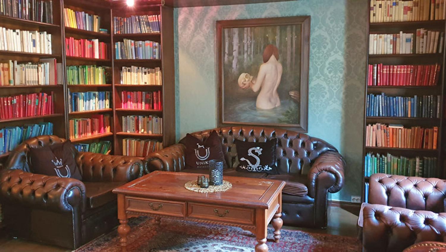 cozy seating area at the library of Seljord Hotell