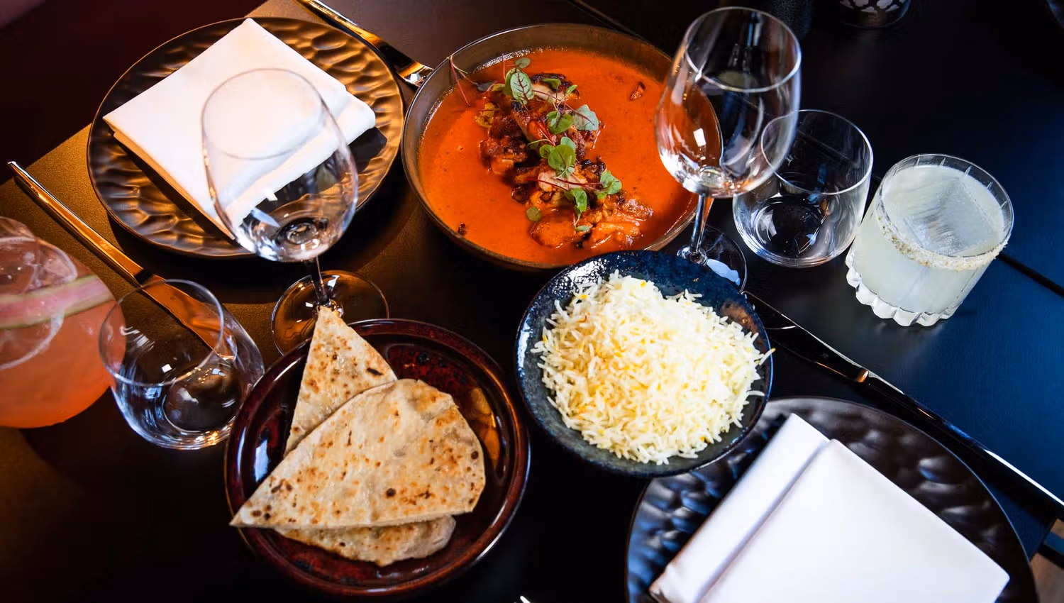 Various bowls of food on a table