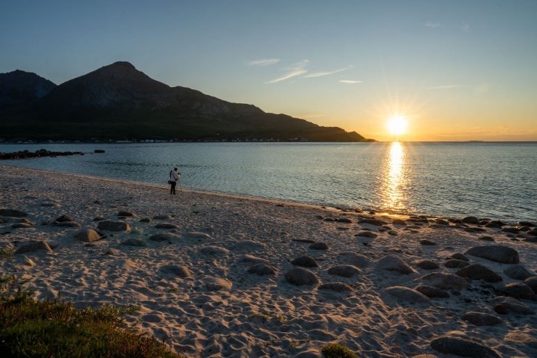 Beach with mountains in the background