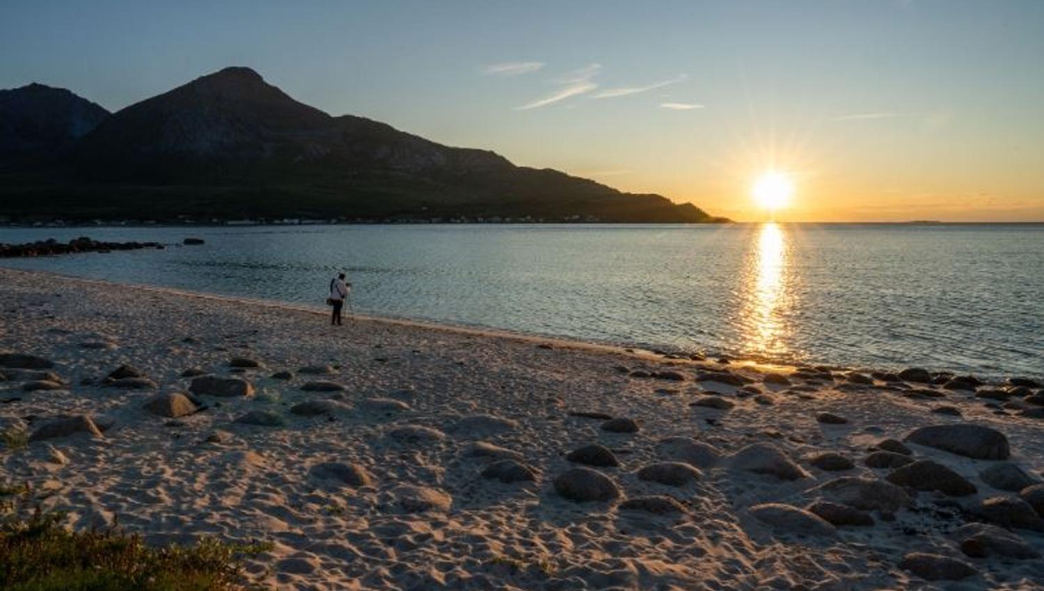 Beach with mountains in the background