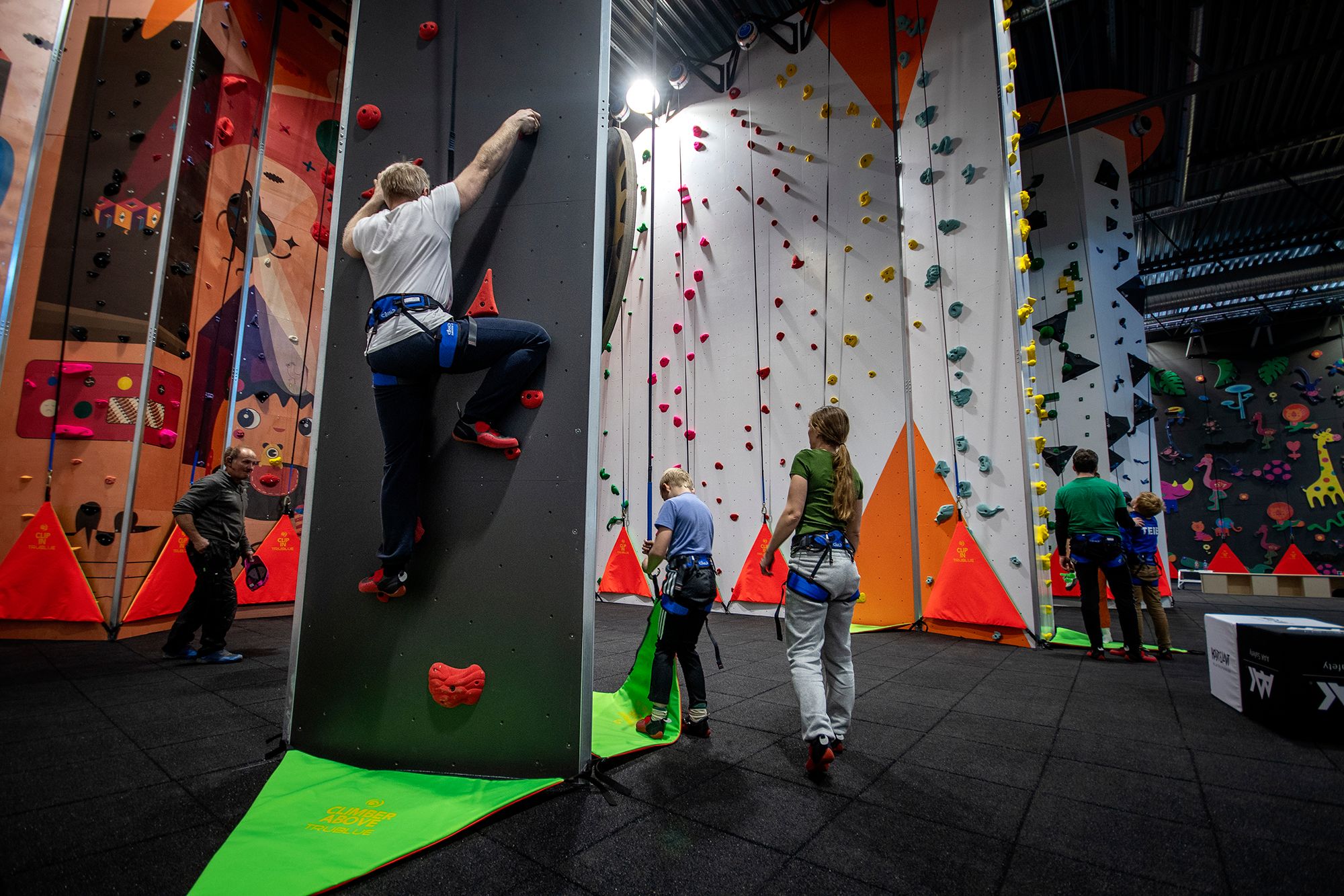 People climb the climbing wall