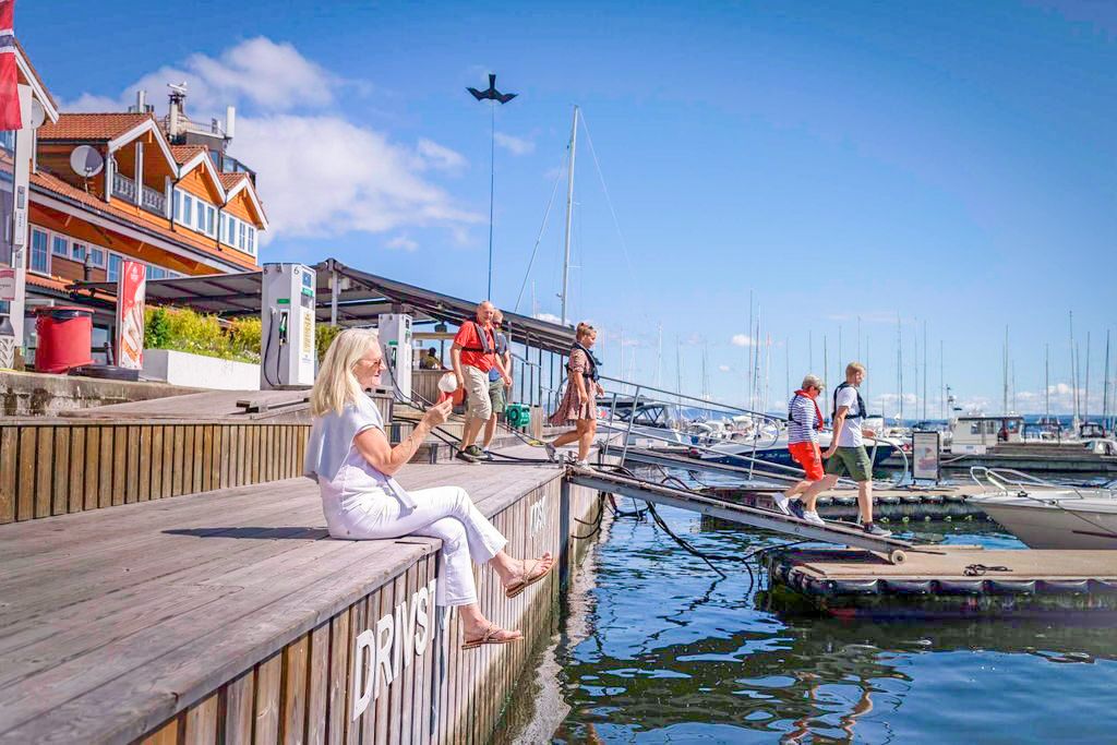 Lady eating icecream on the jetty