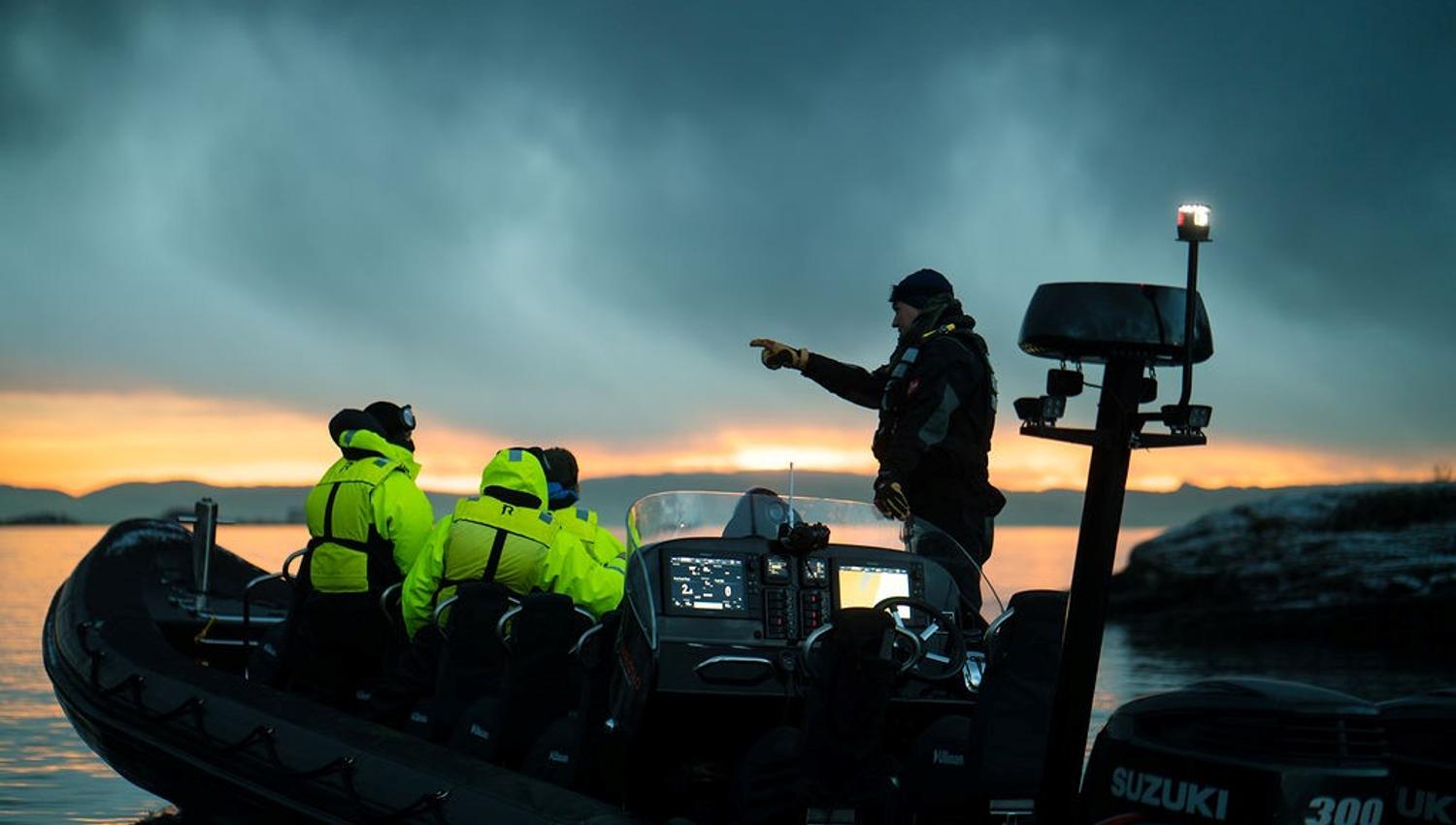 RIB pilot guiding passengers in the Oslo Fjord