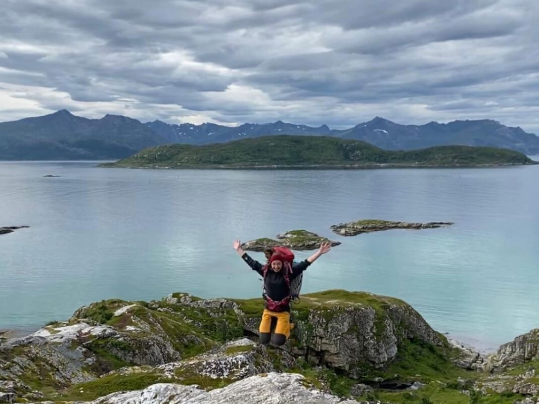 Guest strikes a pose on the mountain