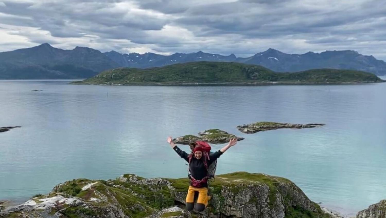 Guest strikes a pose on the mountain