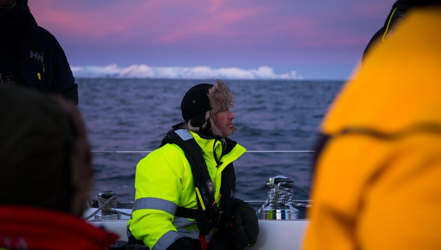 One person enjoying the view on a sailing boat