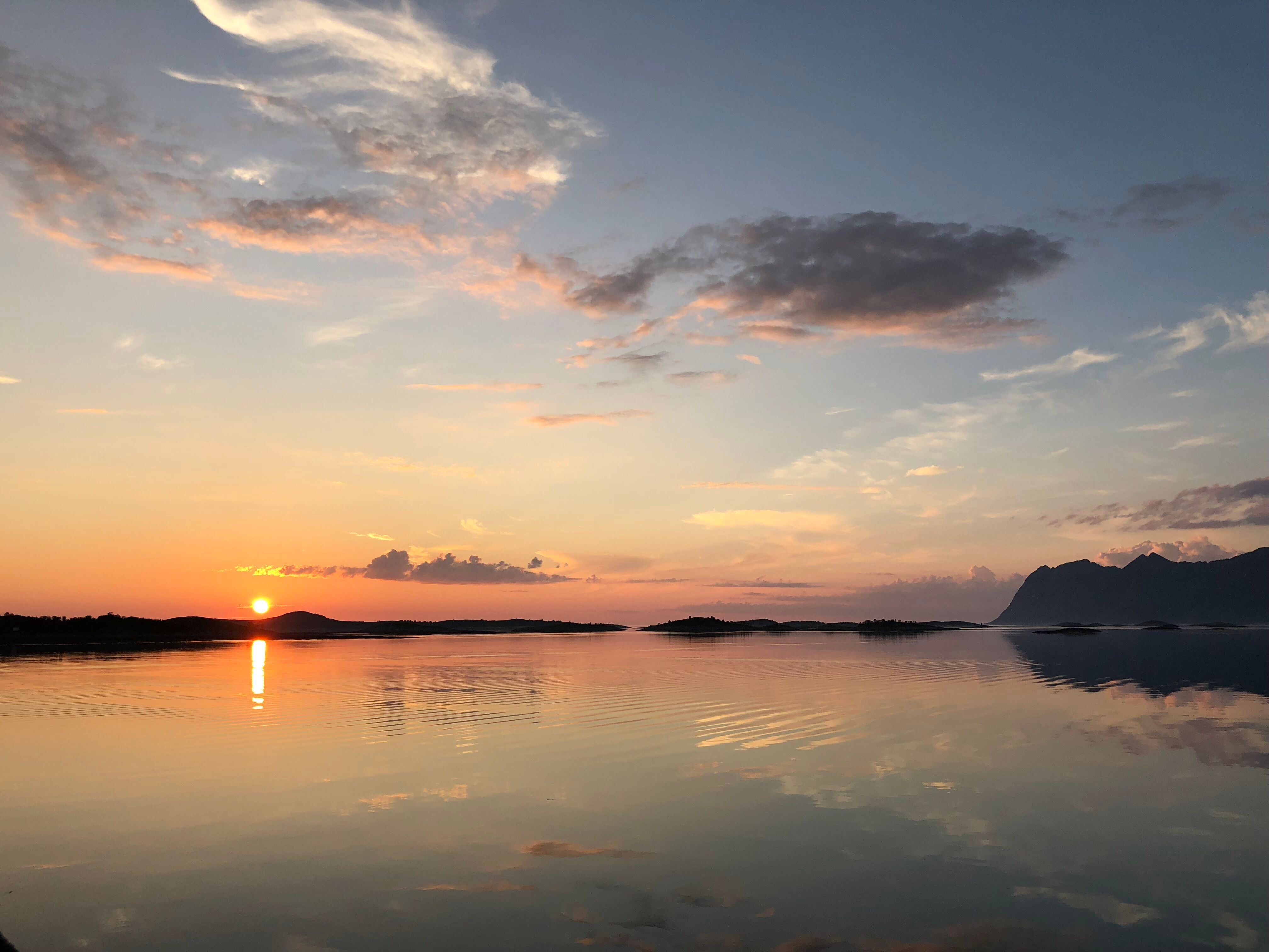 the midnight sun over the fjord