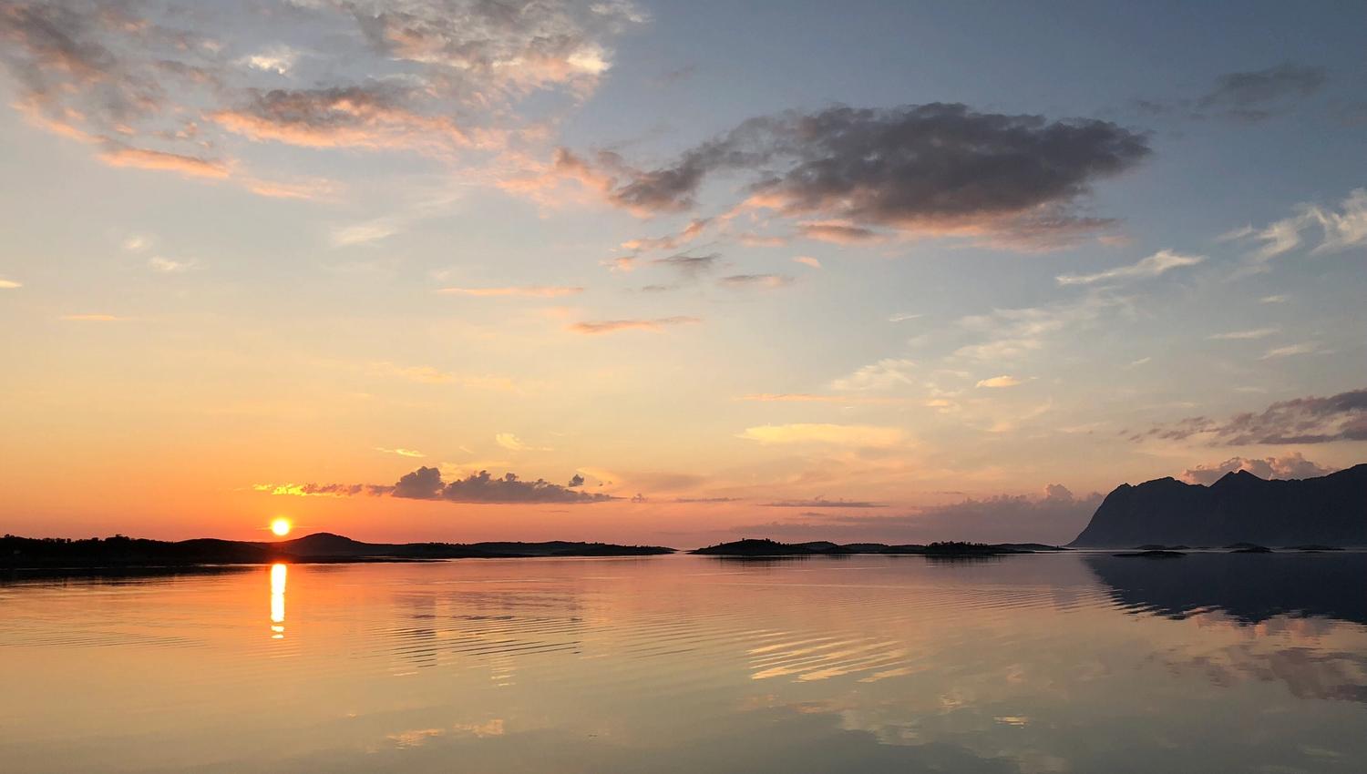 the midnight sun over the fjord