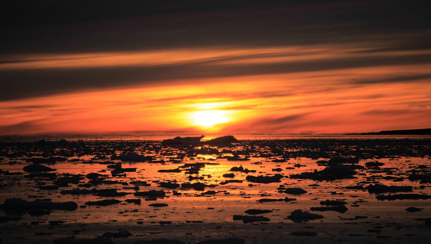 Midnight sun in the horizon