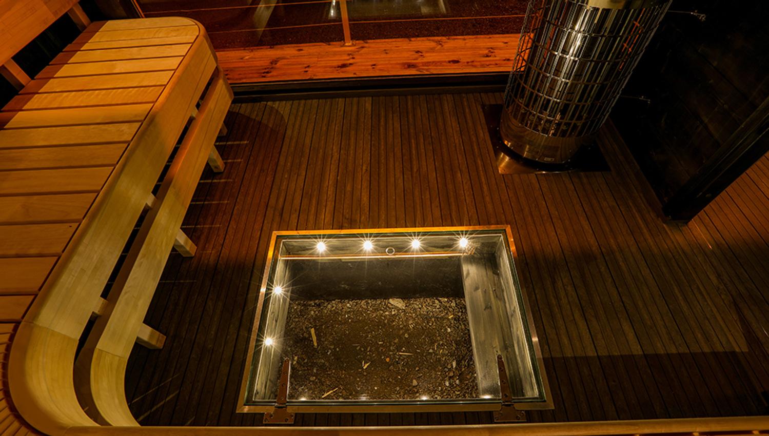 sauna with lighting and window in the floor of the sauna boat Melvin in Porsgrunn