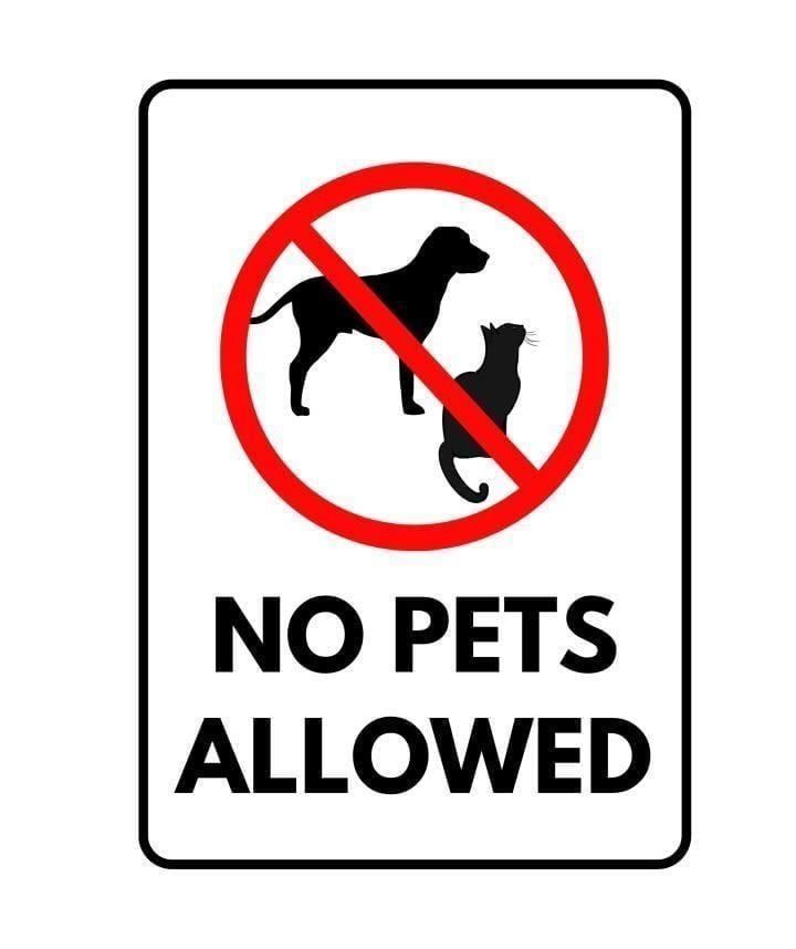 A sign with a dog and cat not allowed