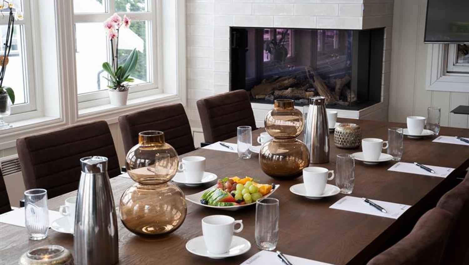 Set for meeting in front of the fireplace