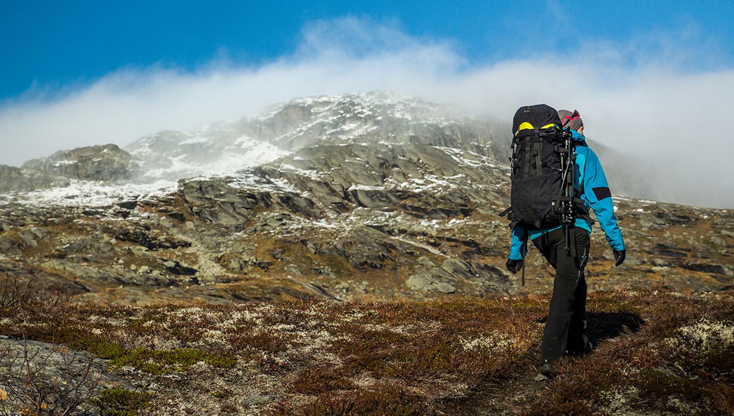 Woman hiking in the mountains.