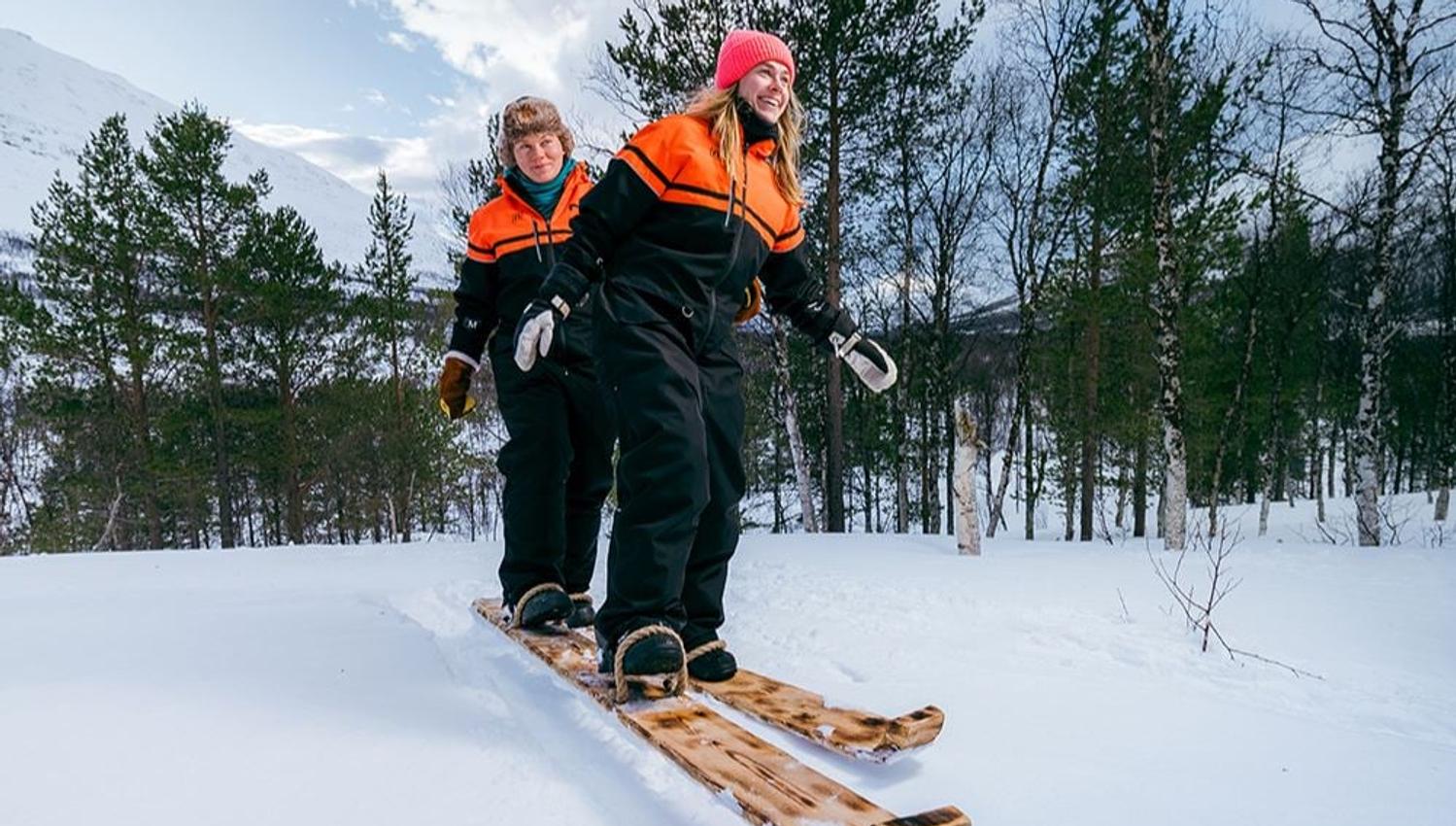 Two guests skiing