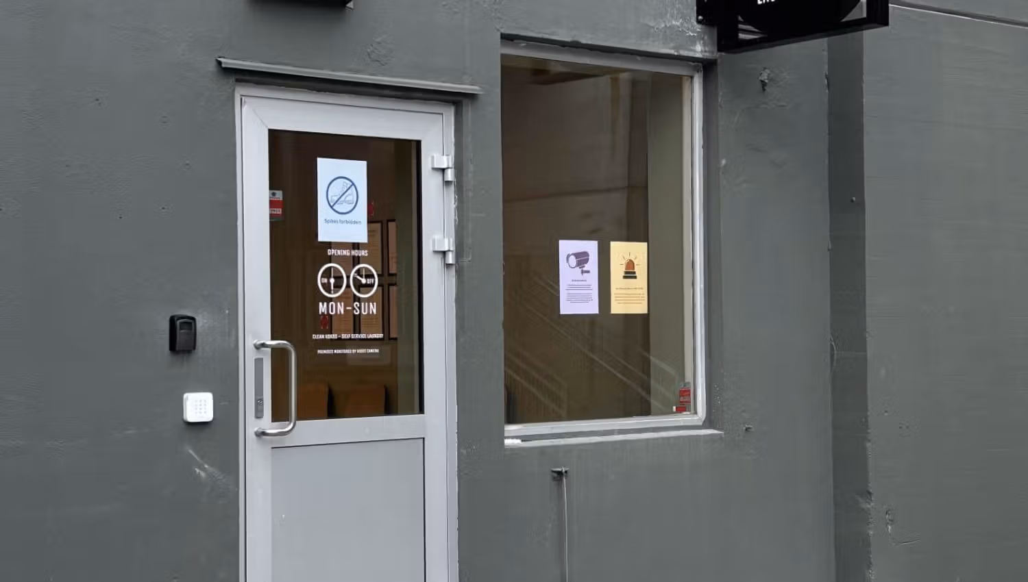 Picture of the outside and entrance to the Clean Kokos Laundromat