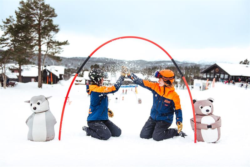 children playing in the snow