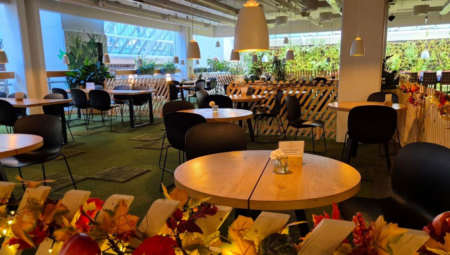 A cafe with chairs and tables