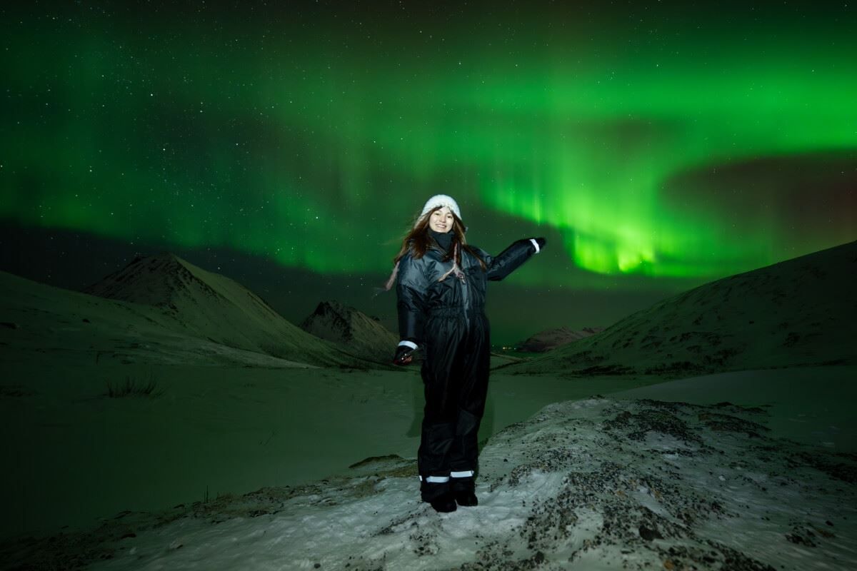 A guest points at the Northern Lights