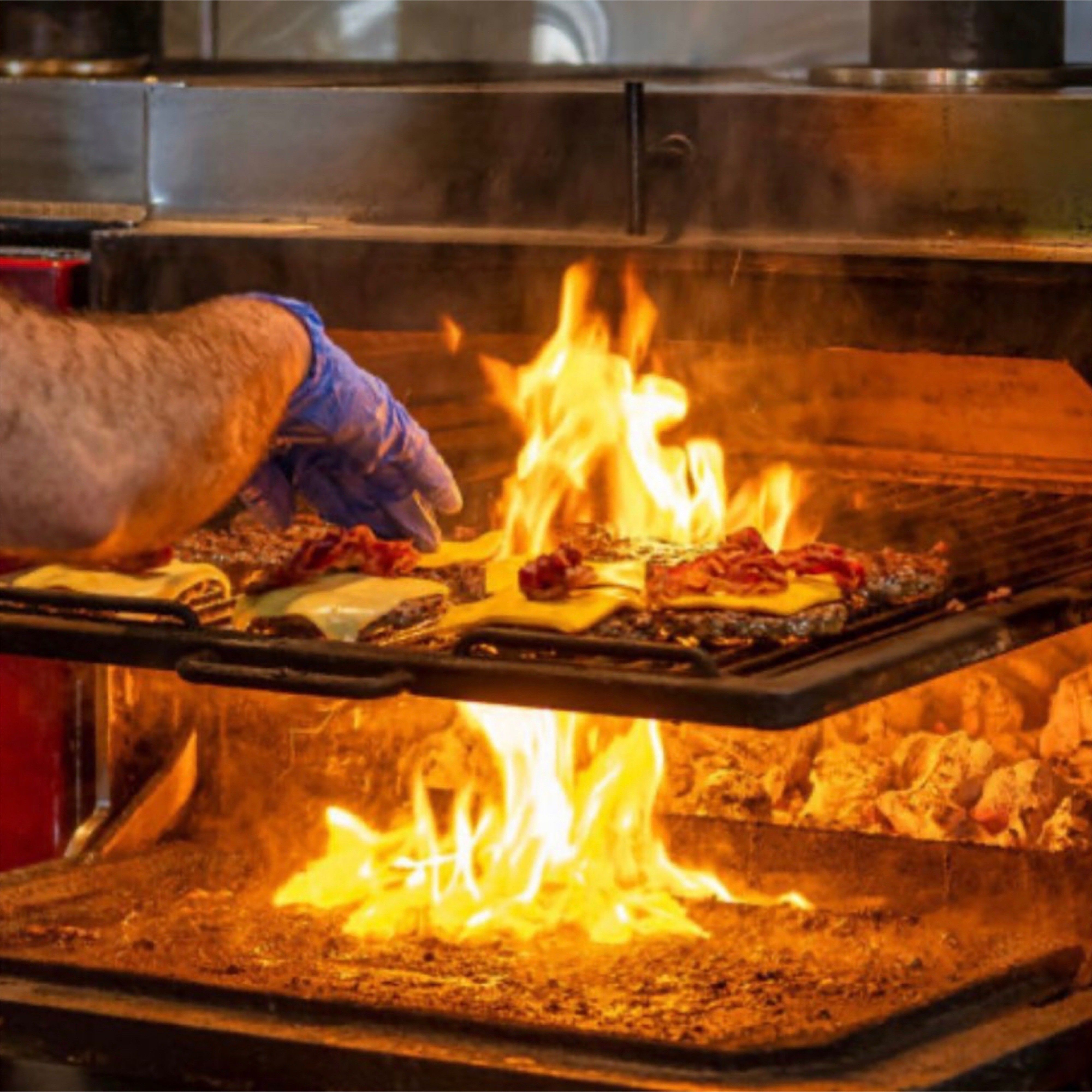 The burgers are grilled over organic coal