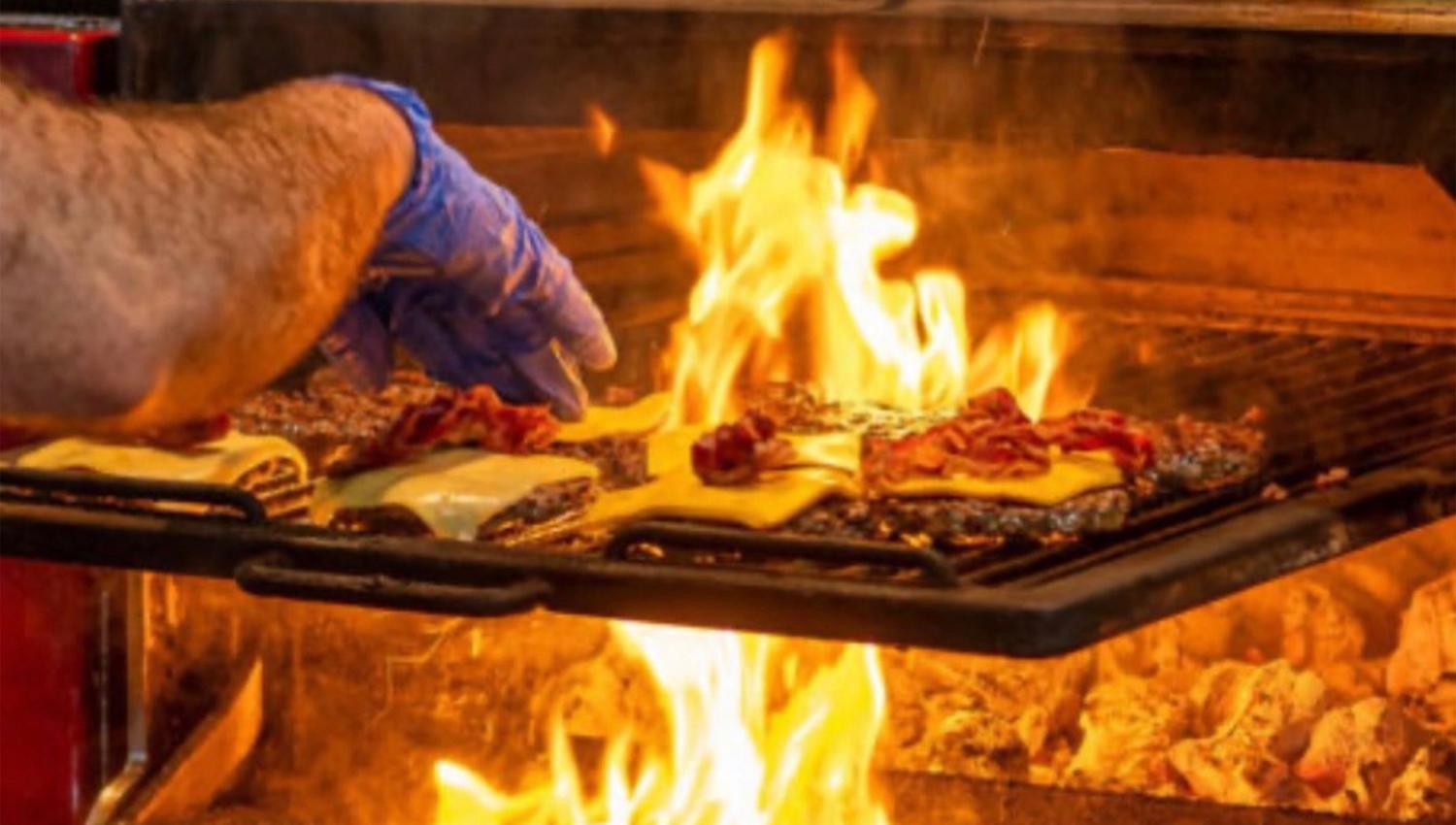 The burgers are grilled over organic coal