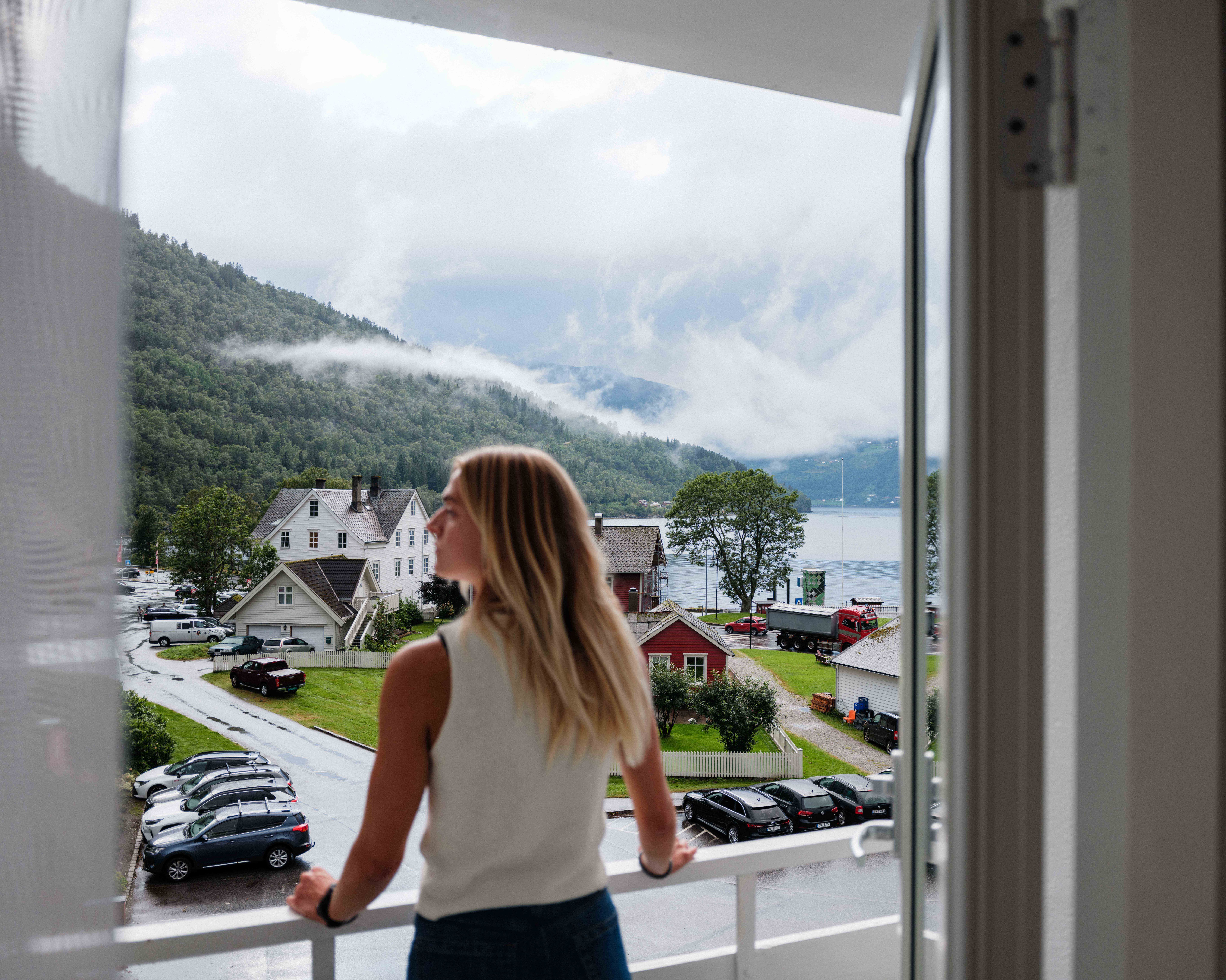 View from the balcony at Kinsarvik Fjordhotel overlooking the Hardangerfjord and Kinsarvik village.