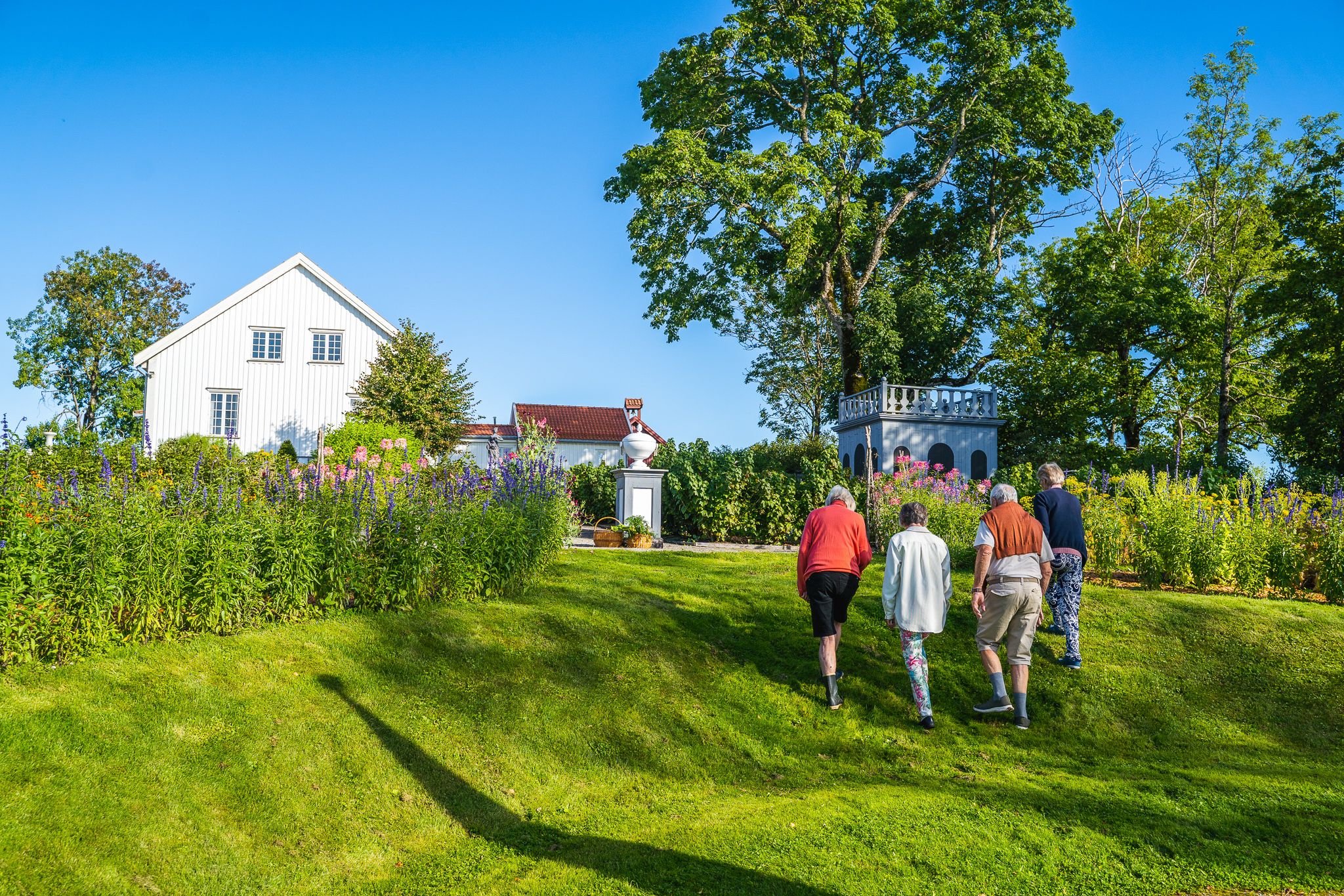 People walk towards building