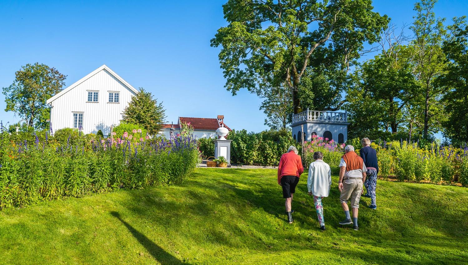 People walk towards building
