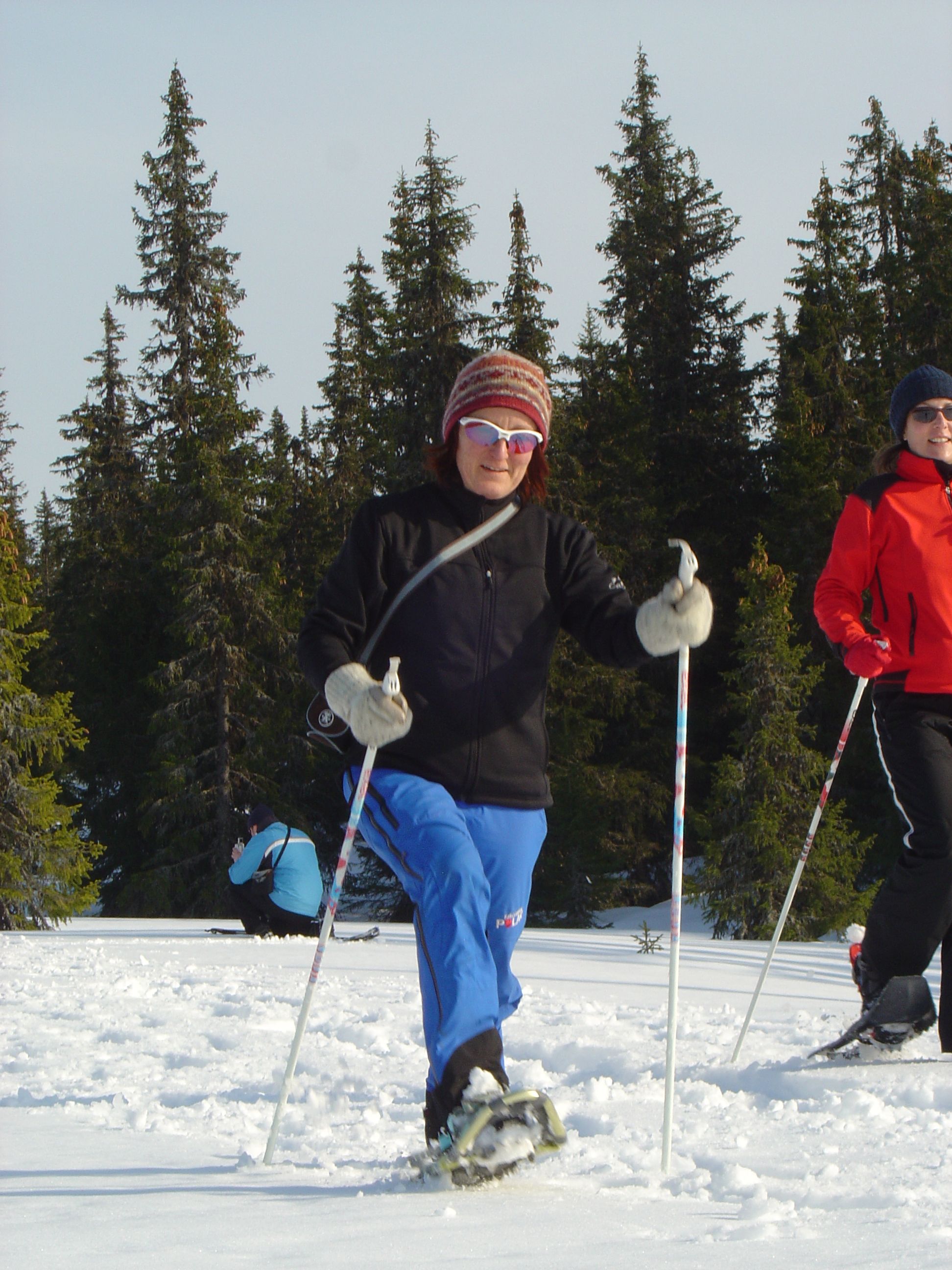 Lady snowshoeing