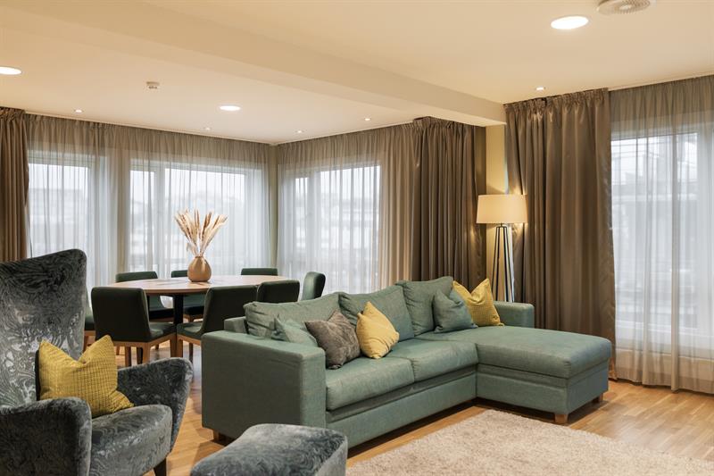 living room in the top suite at Home Hotel Bryggeparken