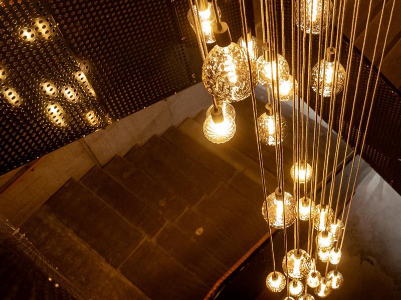 The entrance stairs with a magnificent lamp