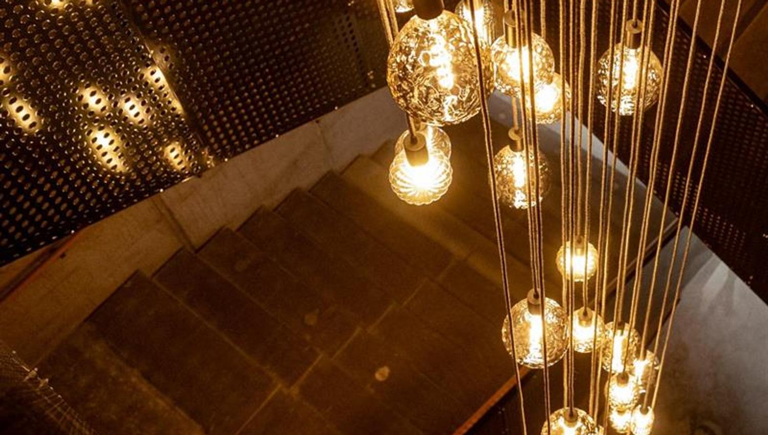 The entrance stairs with a magnificent lamp