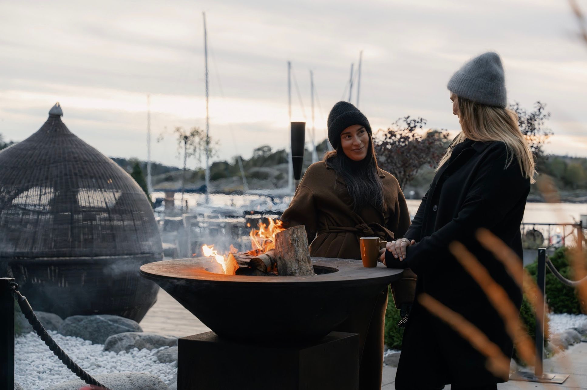 Two women and bon fire